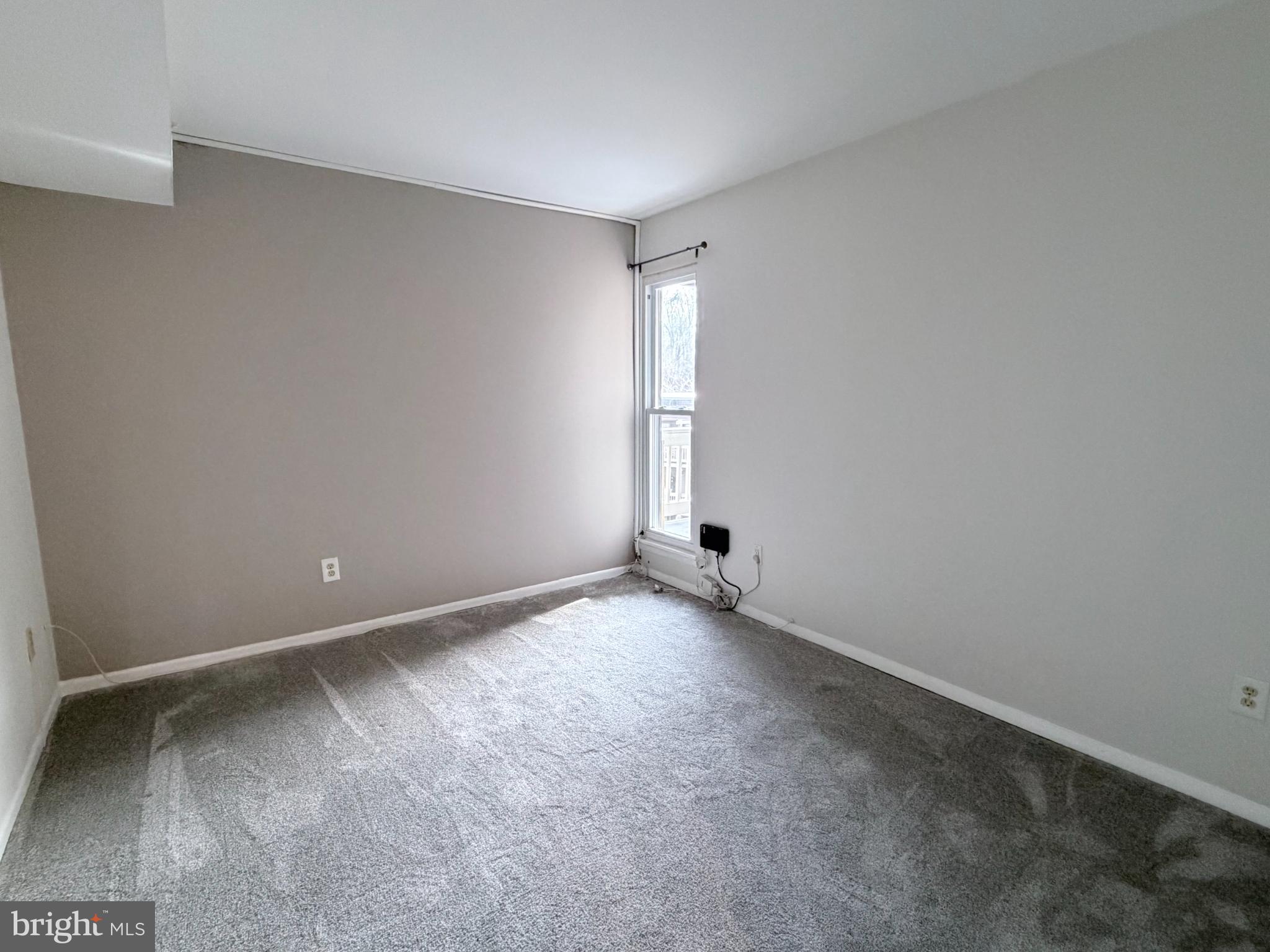 5823 S Royal Ridge Drive Springfield, VA 22152 - Photo 13 of 30 a view of an empty room and window