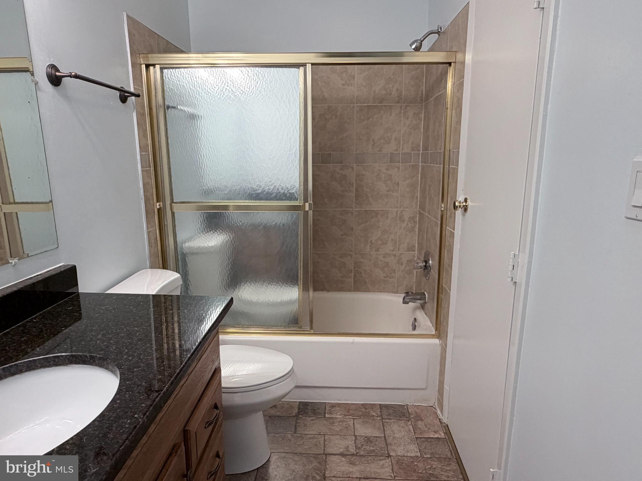 5823 S Royal Ridge Drive Springfield, VA 22152 - Photo 20 of 30 a bathroom with a sink toilet and shower