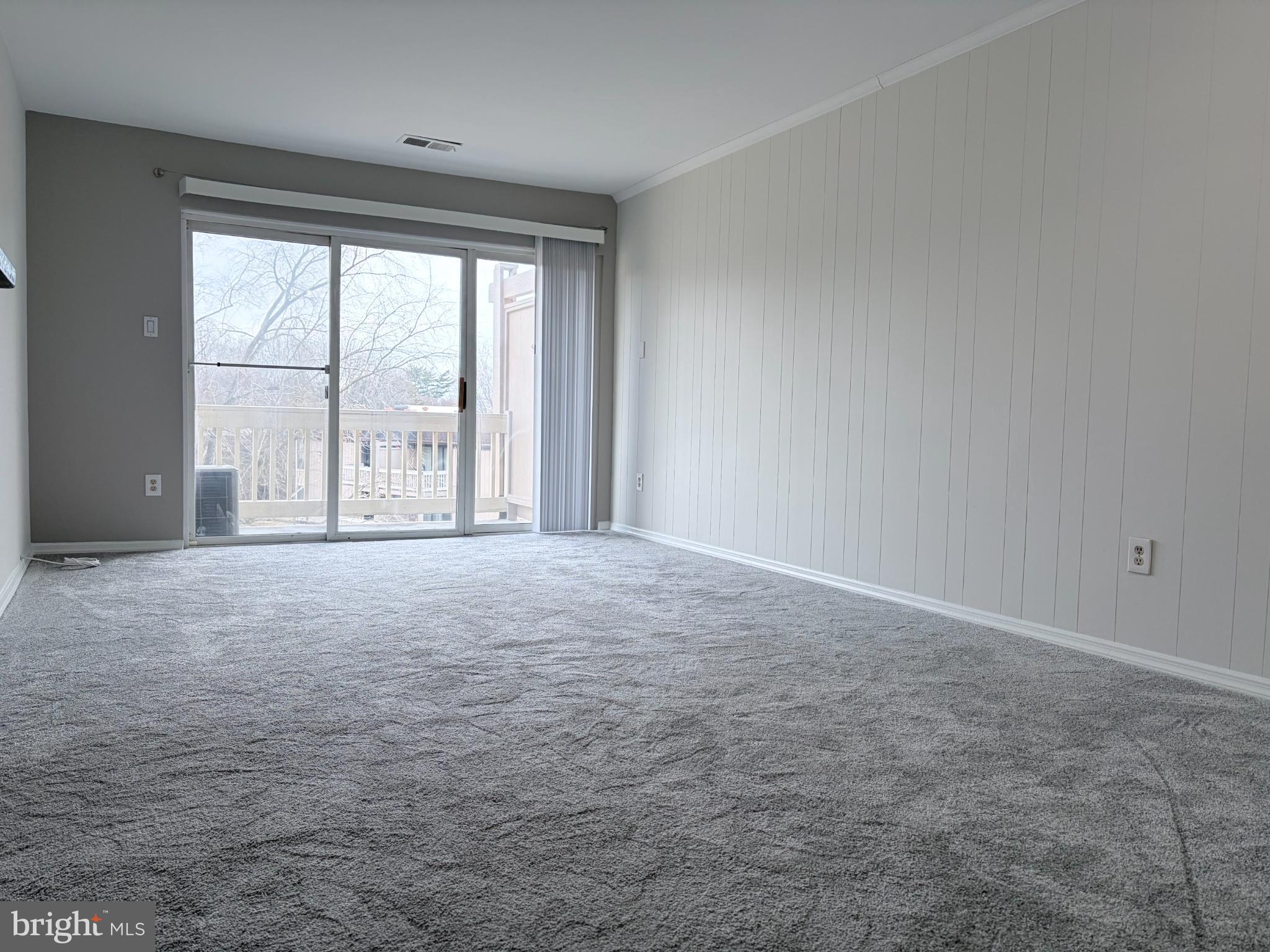 5823 S Royal Ridge Drive Springfield, VA 22152 - Photo 2 of 30 a view of an empty room with a window