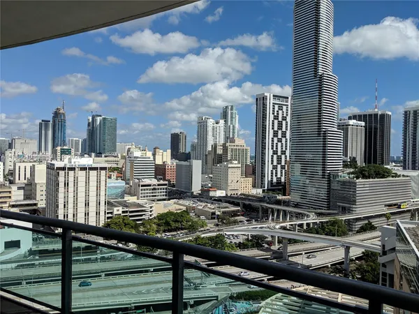 a view of balcony with a potted plant