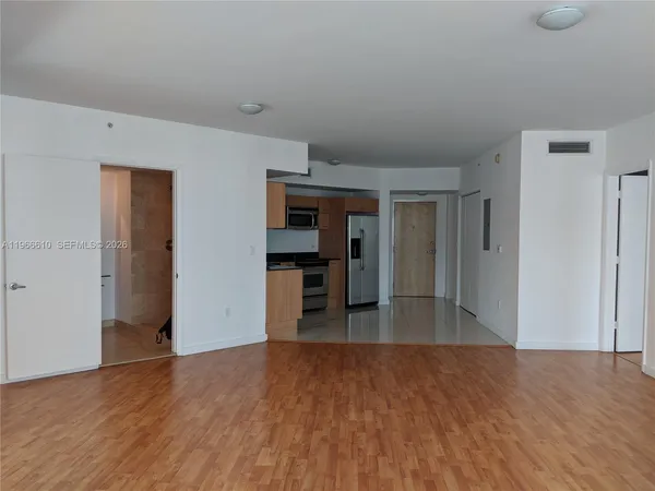 a view of walk in closet with window