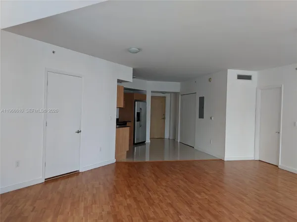 a stove top oven sitting inside of a kitchen