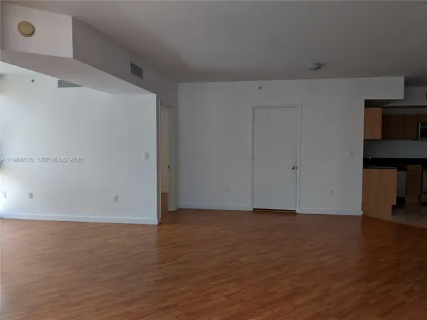 a close view of sink and cabinets