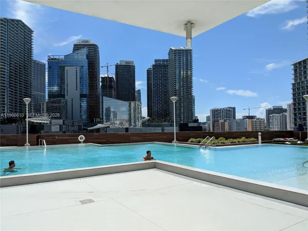 a view of a city with tall buildings