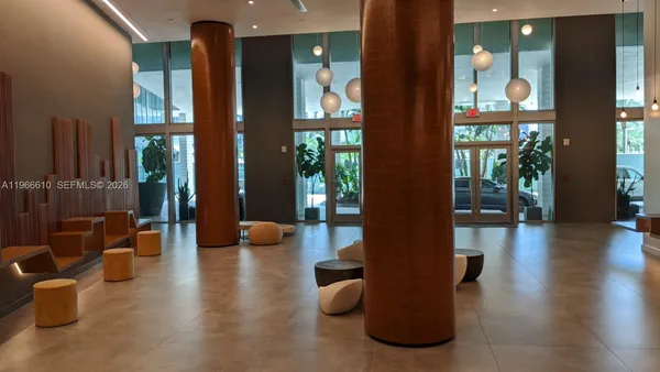 a view of a lake with tall buildings