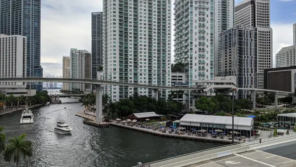 a view of a city with tall buildings