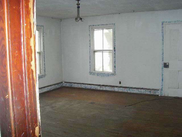 142 East Hanover Road Elizabeth, IL 61028 - Photo 4 of 9 a view of an empty room with a window