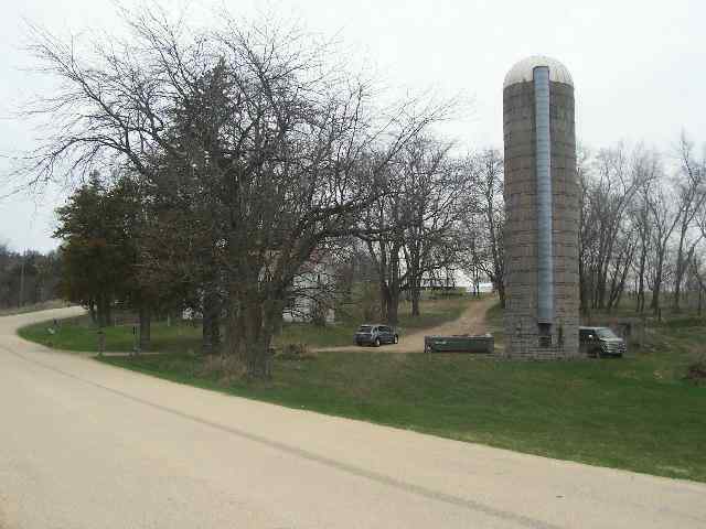 142 East Hanover Road Elizabeth, IL 61028 - Photo 8 of 9 a view of a green field with trees in the background