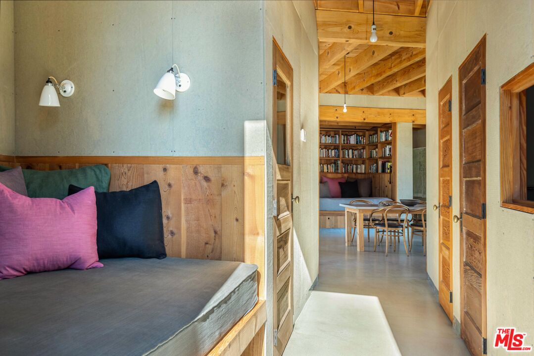 12789 Sailor Flat Road Nevada City, CA 95959 - Photo 12 of 42 a view of a bedroom with furniture and a window