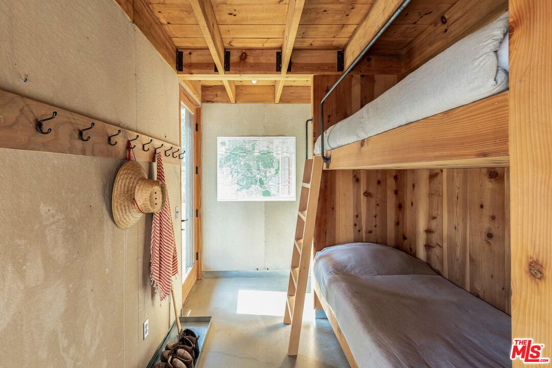 12789 Sailor Flat Road Nevada City, CA 95959 - Photo 17 of 42 a view of a hallway with two windows