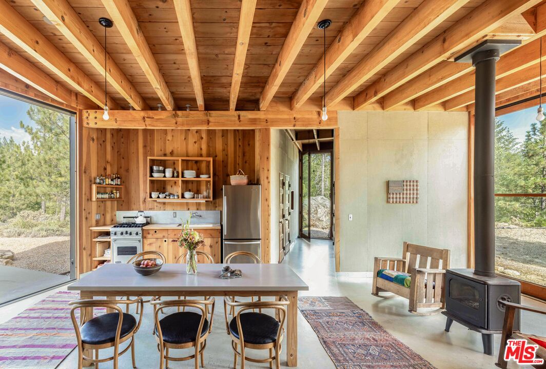 12789 Sailor Flat Road Nevada City, CA 95959 - Photo 19 of 42 a view of a dining room with furniture window and outside view