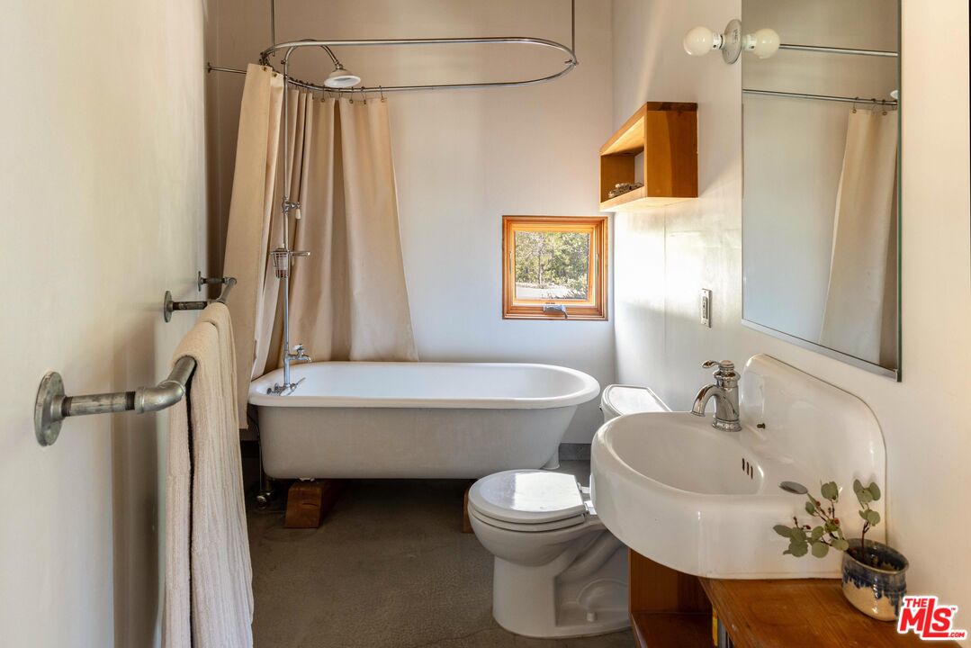 12789 Sailor Flat Road Nevada City, CA 95959 - Photo 21 of 42 a bathroom with a sink toilet and shower