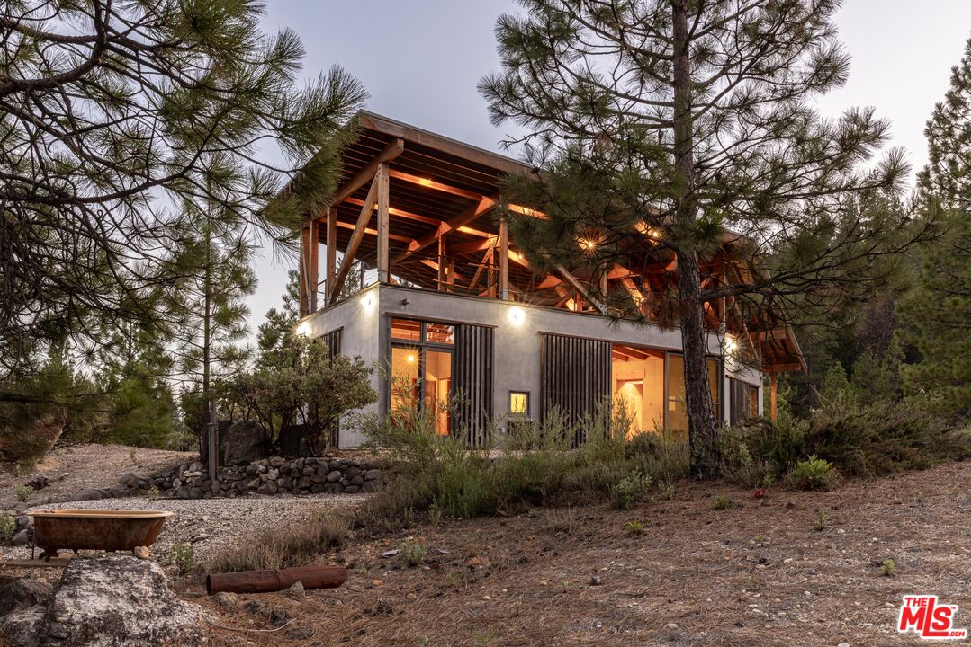 12789 Sailor Flat Road Nevada City, CA 95959 - Photo 37 of 42 a front view of a house with trees and plants