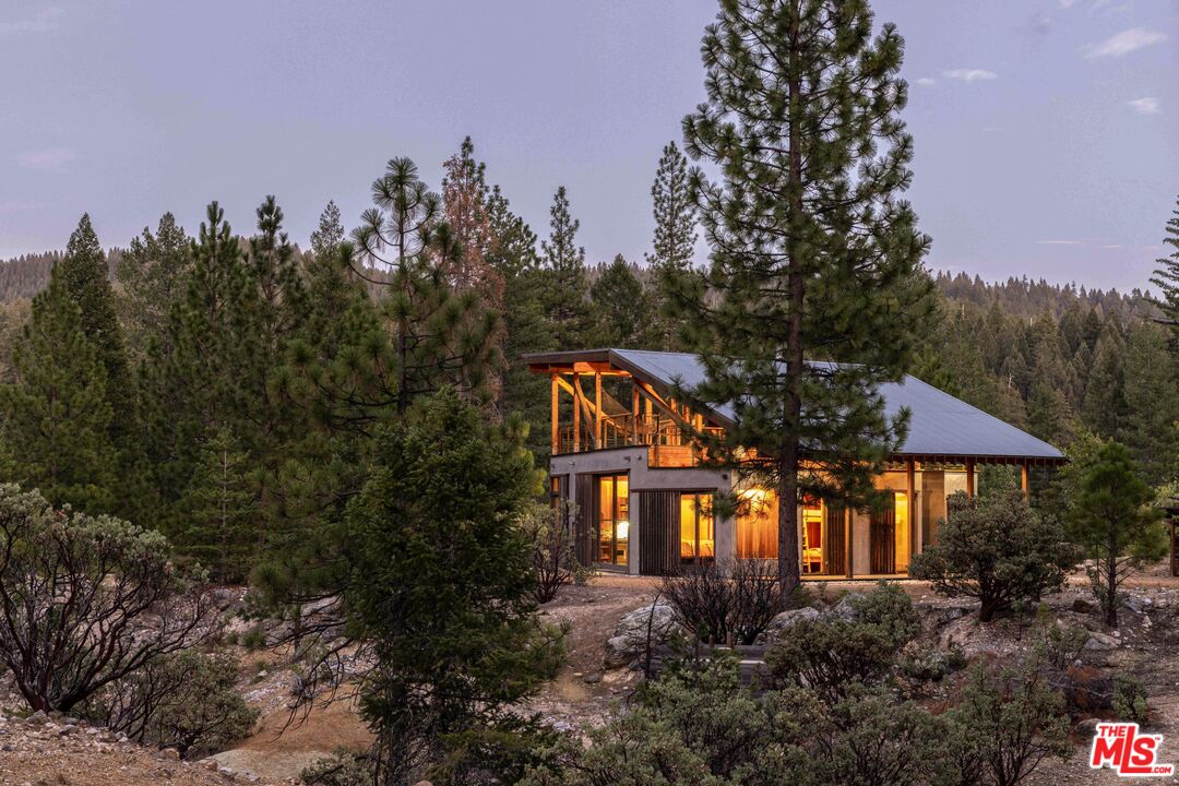 12789 Sailor Flat Road Nevada City, CA 95959 - Photo 39 of 42 a front view of a house with a yard and mountain view in back