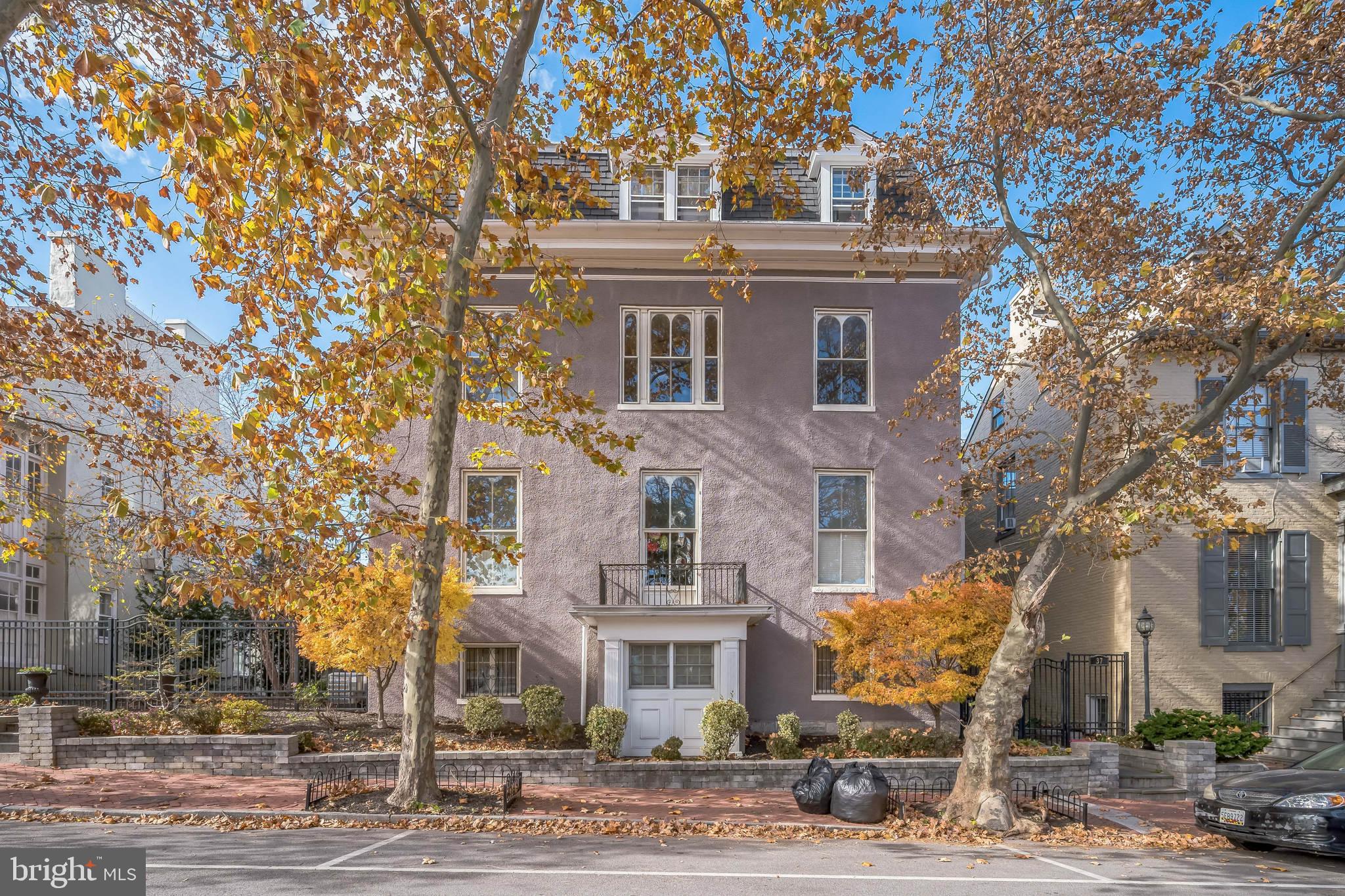 37 South Prospect Street, Unit 401 Hagerstown, MD 21740 - Photo 14 of 15 a front view of a building with lot of trees