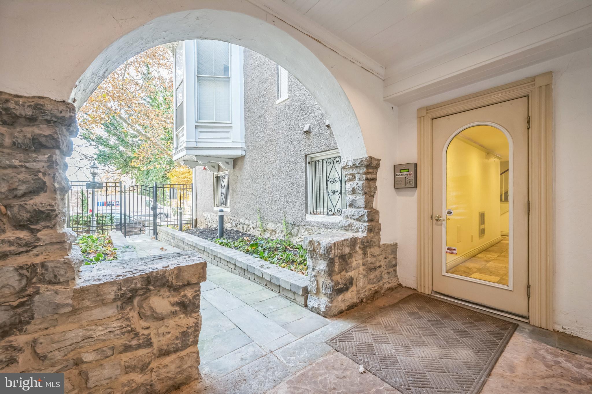 37 South Prospect Street, Unit 401 Hagerstown, MD 21740 - Photo 2 of 15 a view of an entryway with wooden floor and door