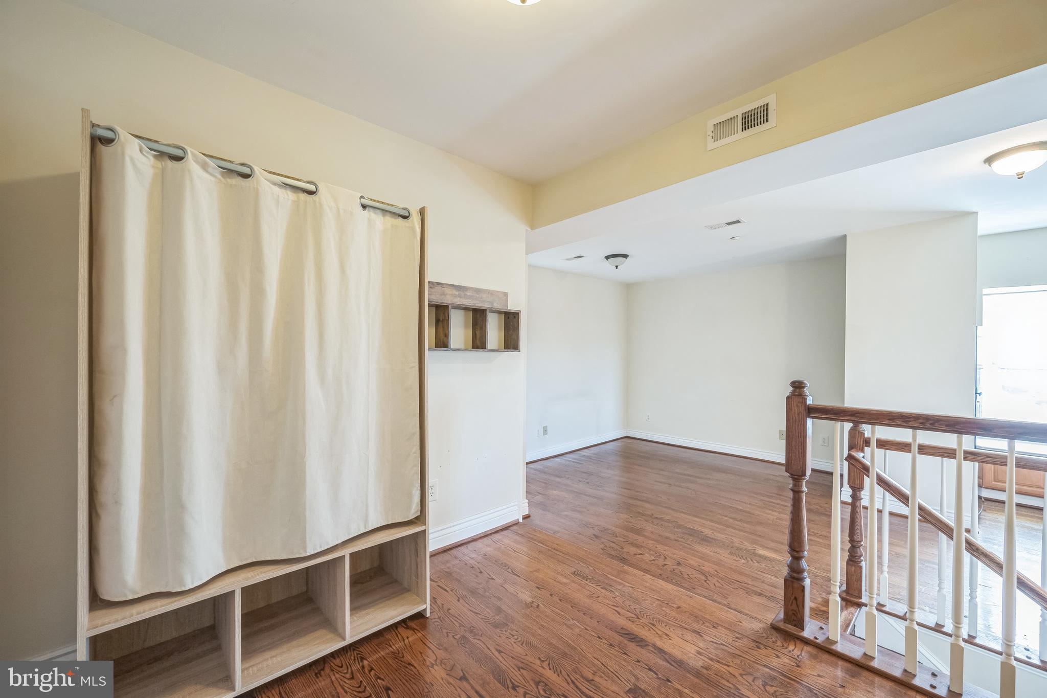 37 South Prospect Street, Unit 401 Hagerstown, MD 21740 - Photo 6 of 15 a view of entryway with wooden floor