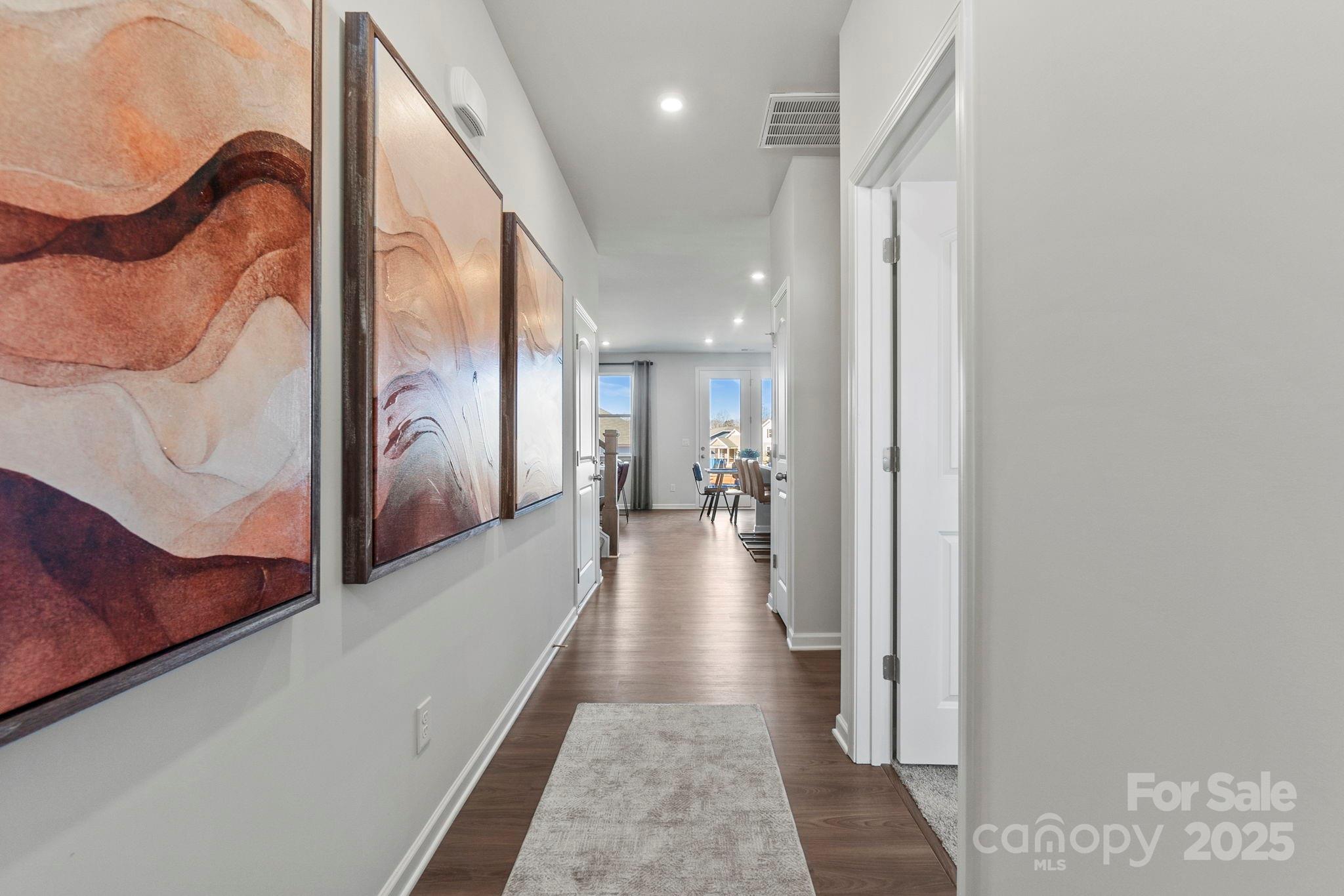 8130 Chilkoot Lane Locust, NC 28097 - Photo 2 of 28 a view of a hallway view with staircase