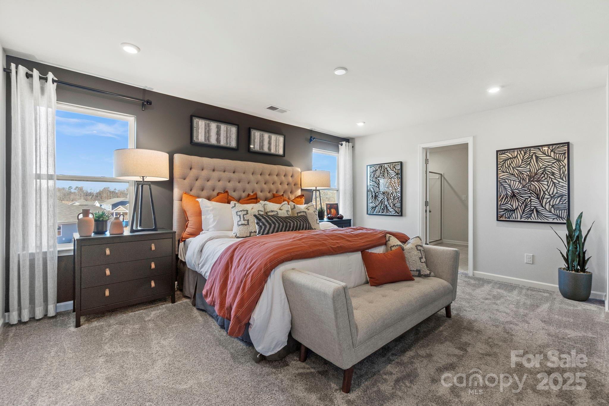 8130 Chilkoot Lane Locust, NC 28097 - Photo 22 of 28 a bedroom with a bed and window