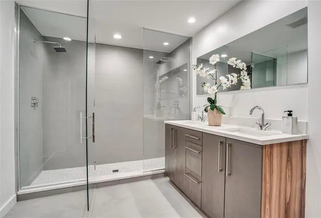 a bedroom with a bed a window and table