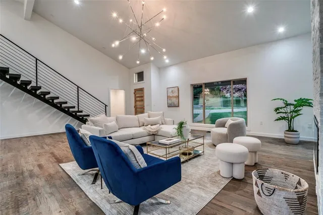 a view of a livingroom with wooden floor
