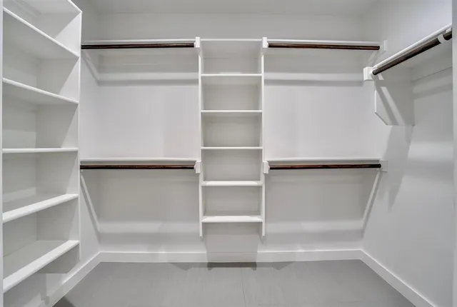 a bathroom with a shower and a bathtub