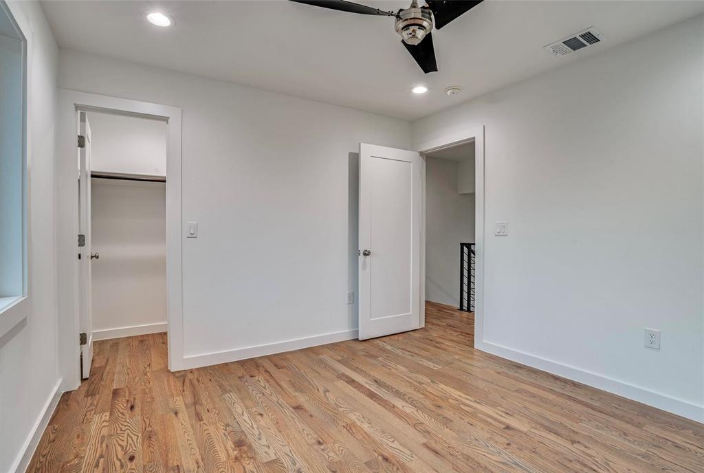 1408 South Alamo Road Rockwall, TX 75087 - Photo 34 of 40 wooden floor in an empty room with a window