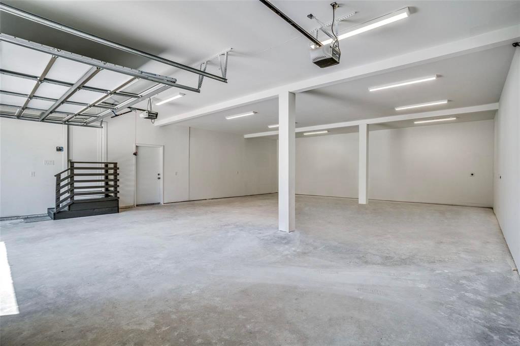 1408 South Alamo Road Rockwall, TX 75087 - Photo 36 of 40 an empty room with a ceiling fan and entryway