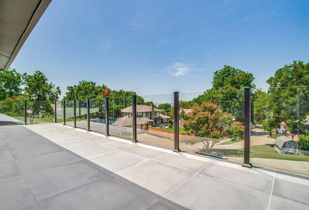 1408 South Alamo Road Rockwall, TX 75087 - Photo 38 of 40 a view of a yard with potted plants