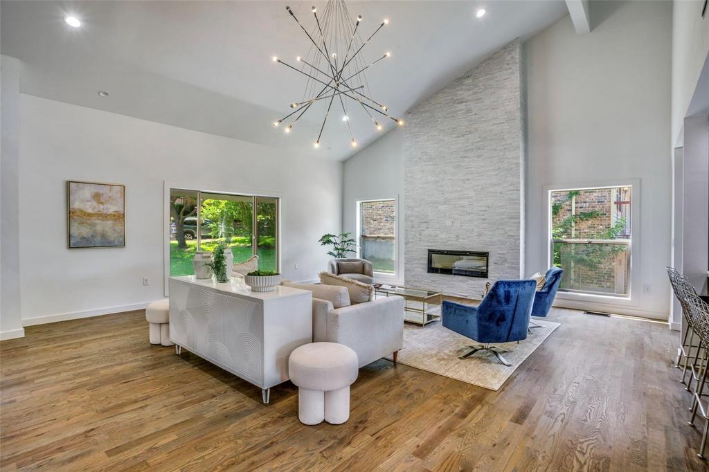 1408 South Alamo Road Rockwall, TX 75087 - Photo 5 of 40 a living room with furniture and a fireplace