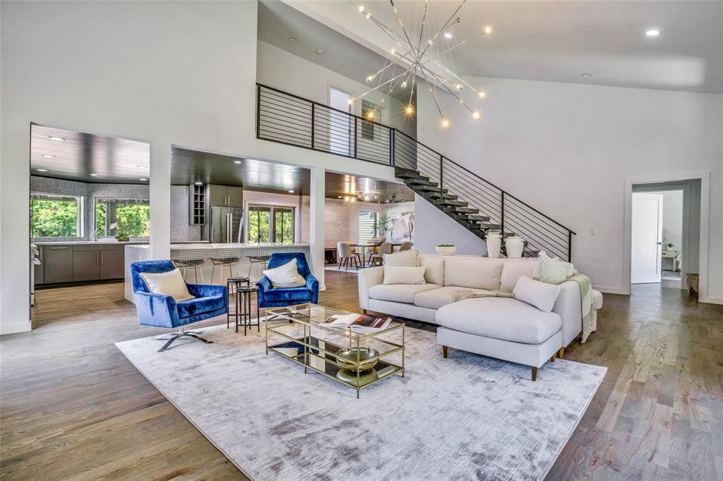 1408 South Alamo Road Rockwall, TX 75087 - Photo 6 of 40 a living room with furniture and wooden floor