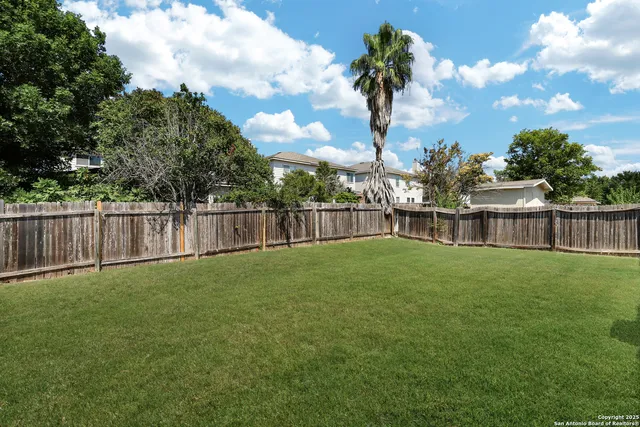 a view of a backyard with a garden