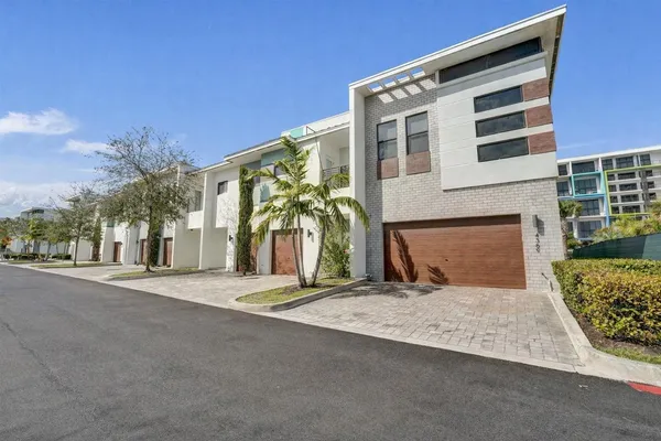 front view of a building with a yard