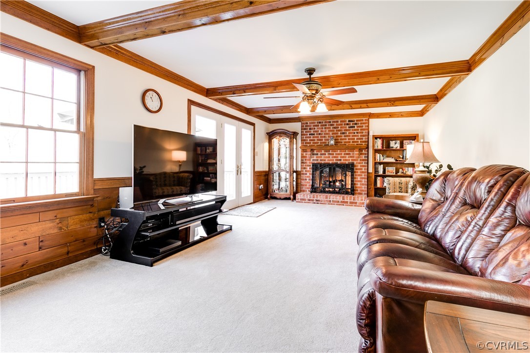 14302 Chimney House Road Midlothian, VA 23112 - Photo 20 of 50 a living room with furniture and a flat screen tv