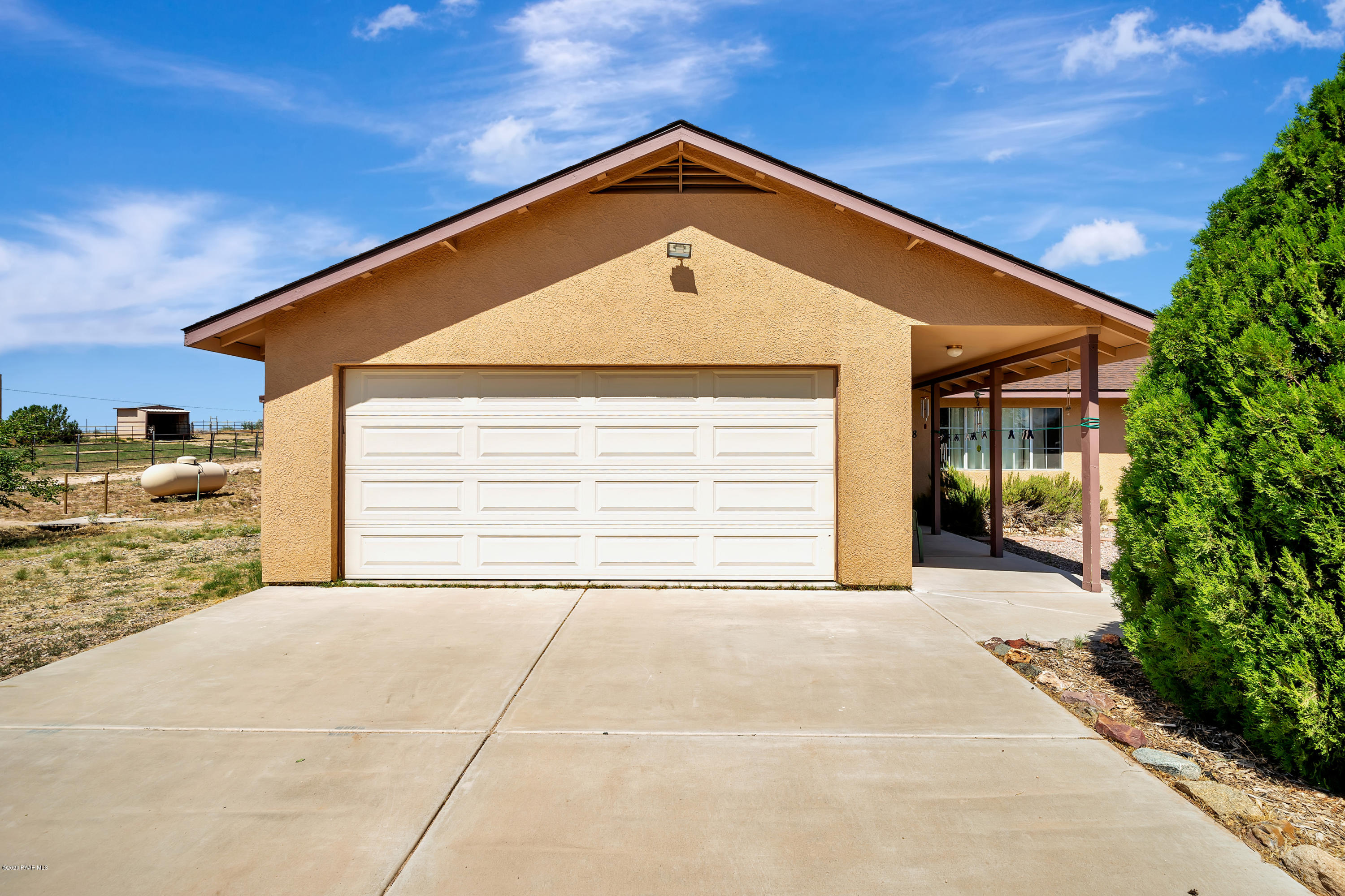 788 West Iris Road Paulden, AZ 86334 - Photo 3 of 45 a front view of a house with a garage
