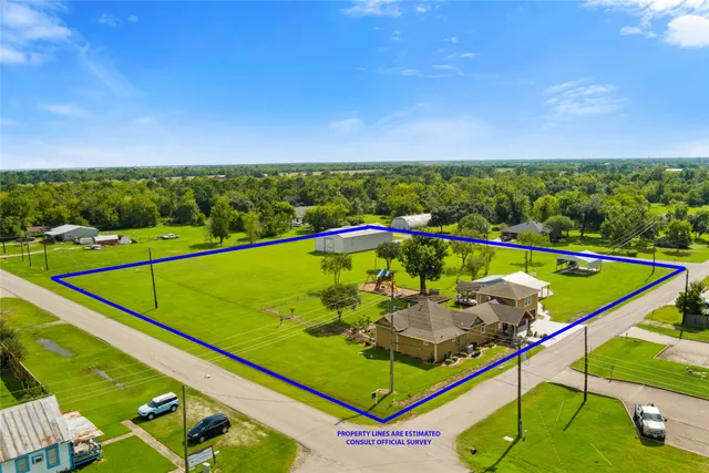 a view of swimming pool with seating area
