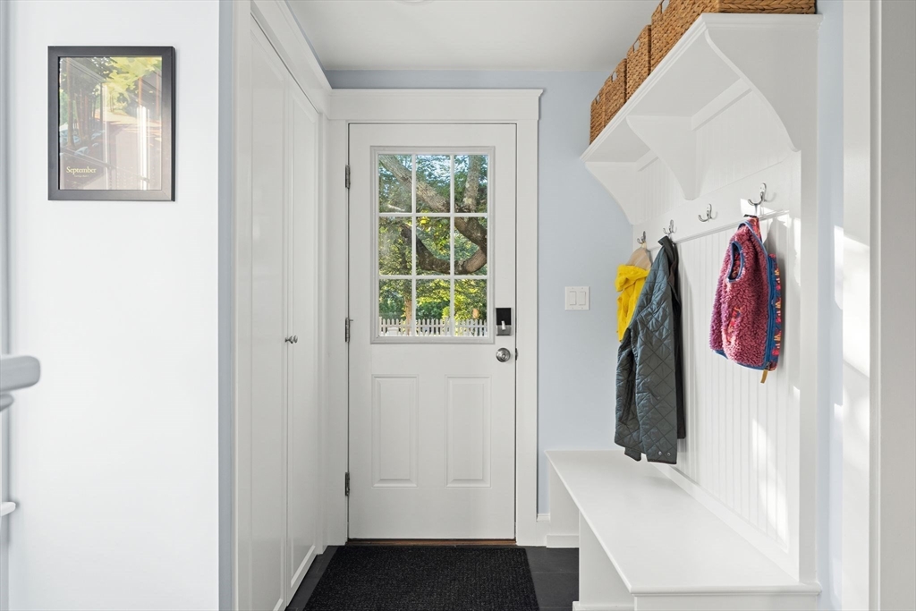 4 Windemere Park Extension Manchester, MA 01944 - Photo 15 of 41 a view of walk in closet with clothes and shoes