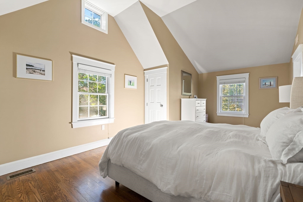 4 Windemere Park Extension Manchester, MA 01944 - Photo 20 of 41 a large bed sitting in a bedroom next to a window