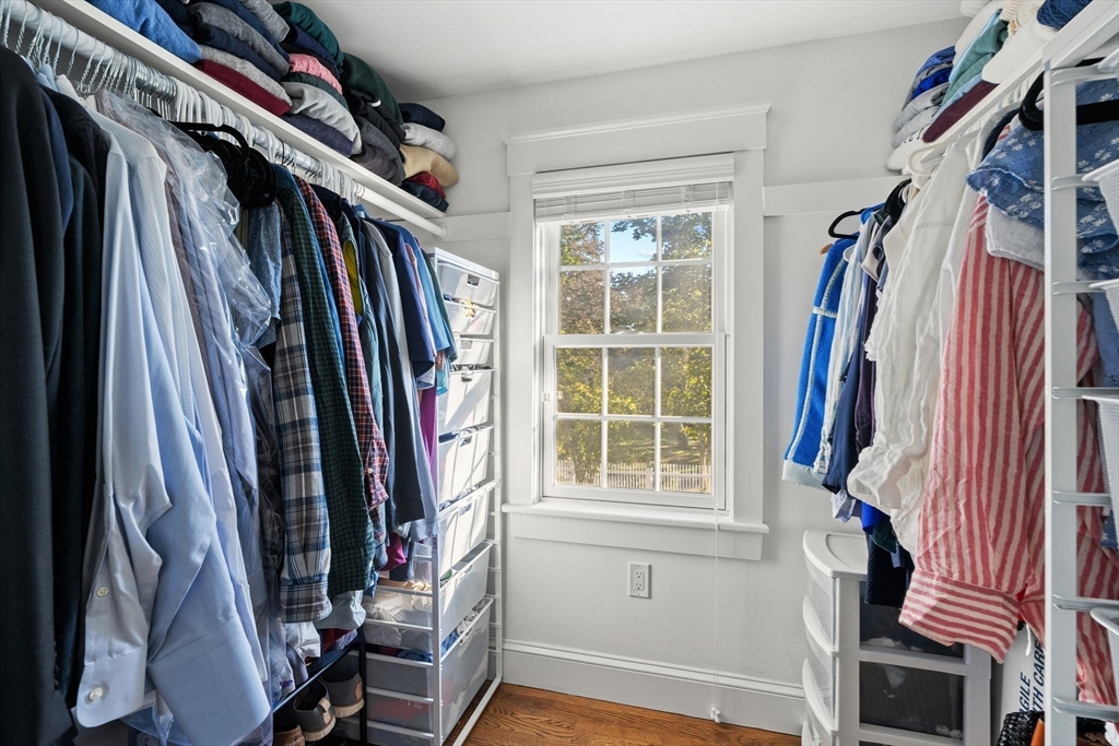 4 Windemere Park Extension Manchester, MA 01944 - Photo 23 of 41 a view of walk in closet with clothes and shoes