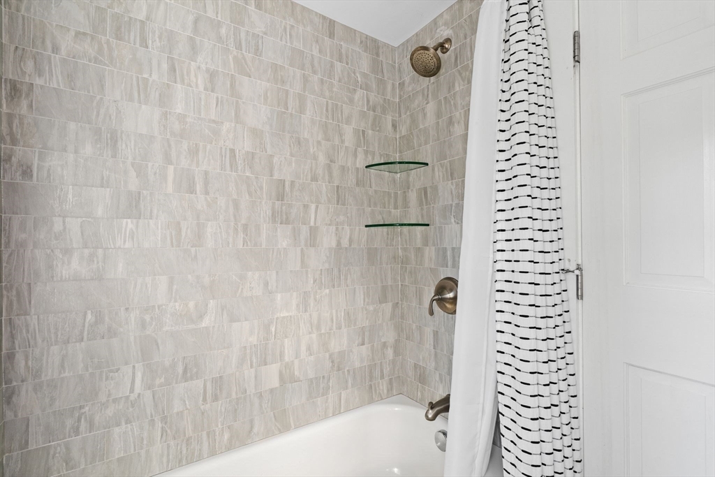 4 Windemere Park Extension Manchester, MA 01944 - Photo 27 of 41 a bathroom with a shower and a bathtub