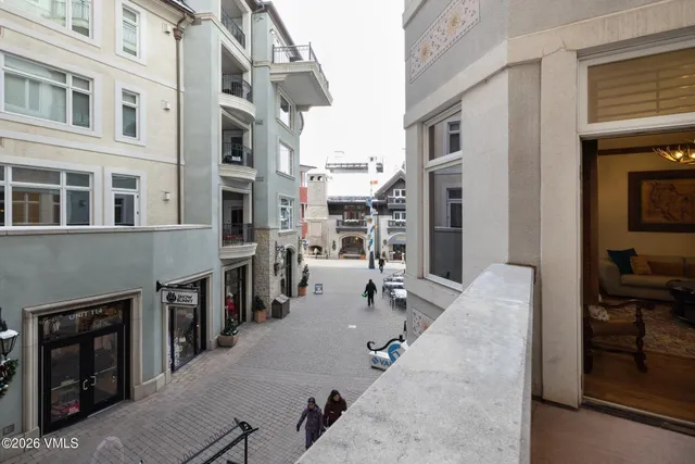 a view of a backyard with sitting area