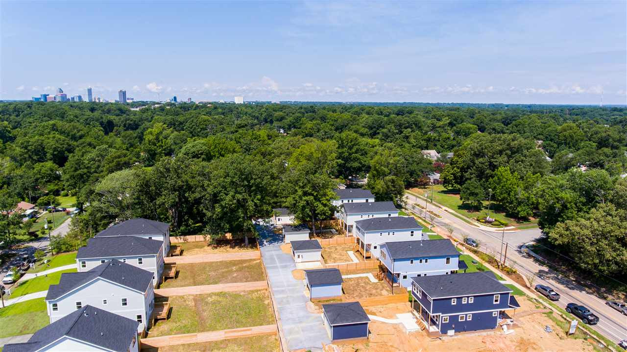 2318 Milburnie Road Raleigh, NC 27610 - Photo 27 of 28 an aerial view of a house with a yard