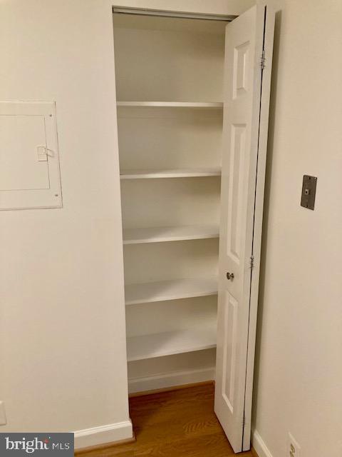 5902 Mt Eagle Drive, Unit 106 Alexandria, VA 22303 - Photo 19 of 73 a view of walk in closet with empty racks