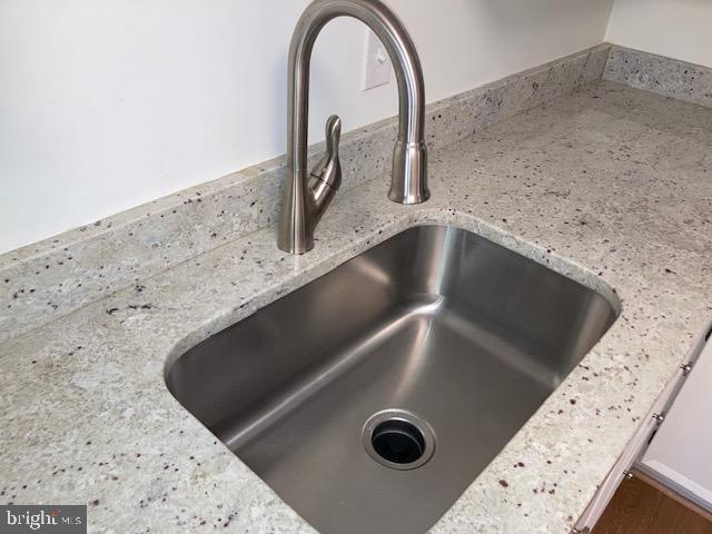 5902 Mt Eagle Drive, Unit 106 Alexandria, VA 22303 - Photo 24 of 73 Deep stainless steel sink and granite countertops.
