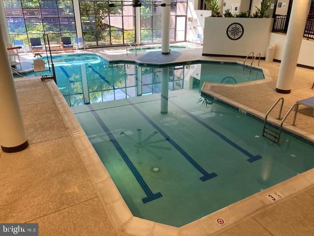 5902 Mt Eagle Drive, Unit 106 Alexandria, VA 22303 - Photo 4 of 73 swimming pool view with a outdoor seating space
