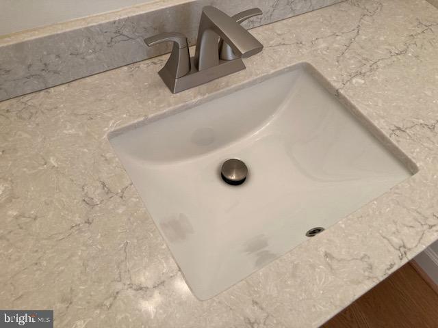 5902 Mt Eagle Drive, Unit 106 Alexandria, VA 22303 - Photo 41 of 73 Primary vanity stone countertop with modern sink.
