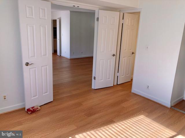 5902 Mt Eagle Drive, Unit 106 Alexandria, VA 22303 - Photo 45 of 73 Second bedroom with open doors.