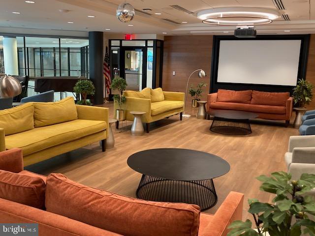 5902 Mt Eagle Drive, Unit 106 Alexandria, VA 22303 - Photo 64 of 73 a outdoor living space with furniture and a potted plant