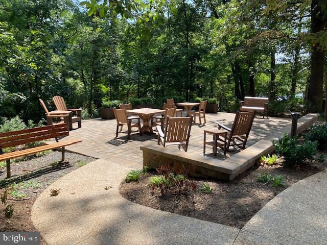 5902 Mt Eagle Drive, Unit 106 Alexandria, VA 22303 - Photo 72 of 73 a view of a backyard with sitting area
