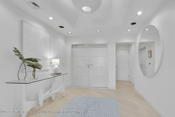 a view of a livingroom with wooden floor